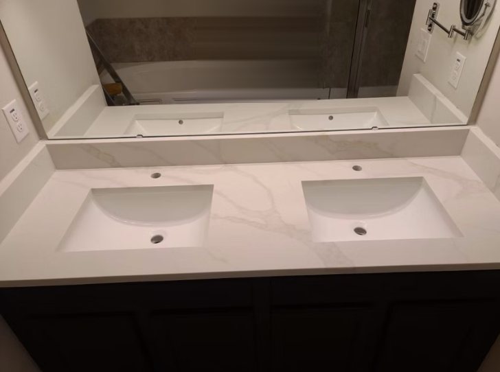 Double vanity with calacatta marble countertop